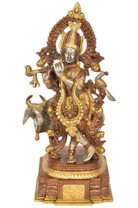 Brass Krishna statue on a cow, ornate detailing, 13 inches