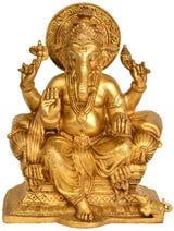 Brass Ganesha statue seated on throne with raised hands, 9 inch