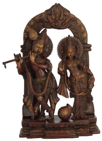 Brass Radha-Krishna double chala sculpture, kneeling figures with milk pot