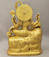 Back view of gold brass Shiva-Parvati statue, ornate halo and engraved detailing