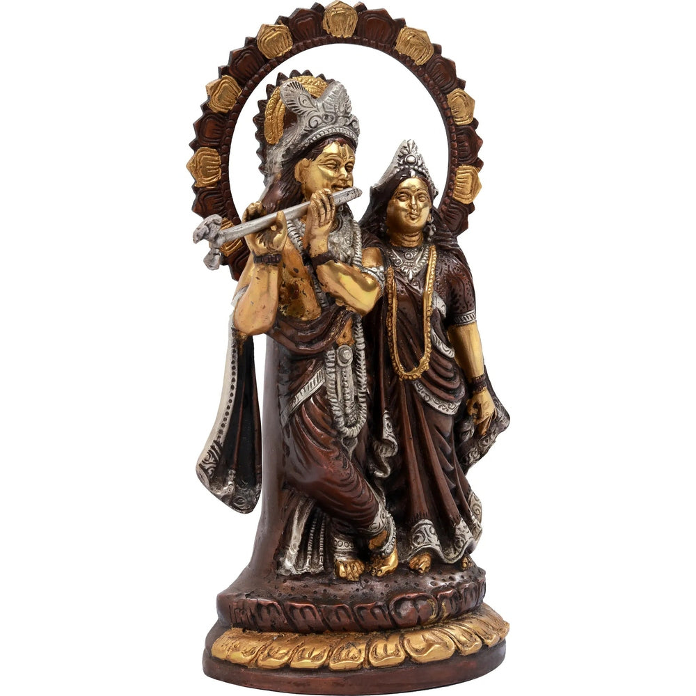 Radha-Krishna idol with lotus-studded halo; Krishna holds flute, Radha beside him