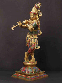 Brass Krishna playing flute statue in Tribhanga pose, detailed multicolor inlay