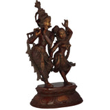 Radha and Krishna engaged dance brass statue on ornate round base, dark bronze