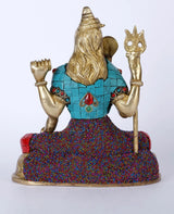 Back view of brass Shiva statue, long hair, Ashirwad mudra pose, teal top and colorful beads