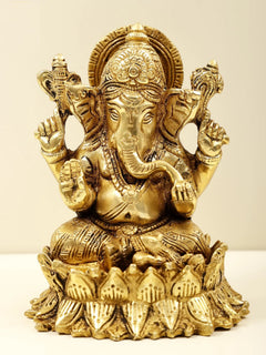 Brass small seated Lord Ganesha figurine with lotus base, detailed golden finish