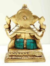 Brass back view of seated Lord Ganesha figure with turquoise waist panels