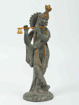 Handcrafted green patina brass Krishna flute statue, side view, arched headdress, golden bars