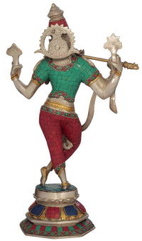 Handmade brass Cosmic Krishna statue from behind, green top and red pants with jeweled details