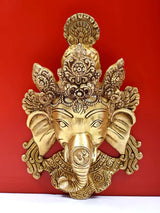 Ganesha brass wall hanging mask with ornate crown and detailed facial features
