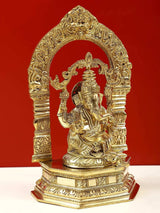 Brass Lord Ganesha statue with arched prabhavali and pedestal base, 9-inch