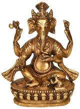 Brass Ganesha idol in Nepalese style, seated with raised arms, 6 inches