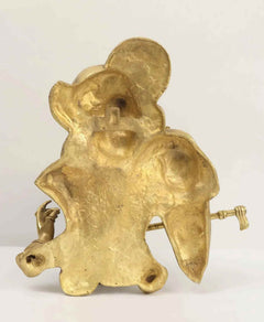 Brass Radha Krishna wall hanging, side view of seated figures with flute