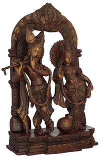 Brass Radha-Krishna double chala sculpture, Radha at right holding pot; Krishna left