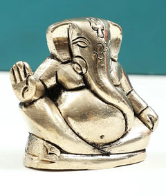 Handmade brass Ganesha good-luck statue, small 2 in, side view with trunk detail