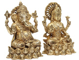 Brass Lakshmi and Ganesha figurines, seated poses with detailed jewelry and raised arms