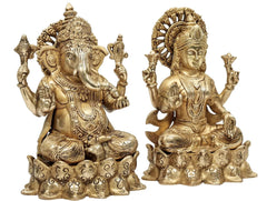 Brass Lakshmi and Ganesha figurines, seated poses with detailed jewelry and raised arms