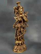 Brass Krishna flute statue, detailed crown and ornaments, angled view, 18 in