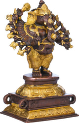 Brass and dark bronze Vira Ganesha figurine with sixteen arms, front three-quarter view