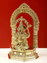 Brass Lord Ganesha on pedestal with detailed kirtimukha prabhavali, 9-inch