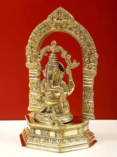 Brass Lord Ganesha on pedestal with detailed kirtimukha prabhavali, 9-inch