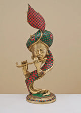 Handmade brass modern Krishna sculpture with red patterned inlay, playing flute