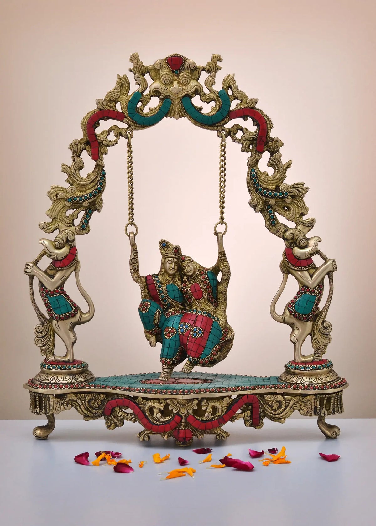 Handmade brass Radha Krishna swing ornament with colorful inlay, two standing figures
