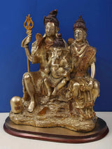Brass Shiva Parvati Ganesha statue, front view with detailed crowns and garlands