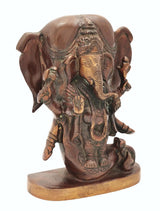 Brass Ganesha figurine with elephant head, ornate trunk and crown, side view