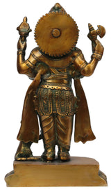 Brass Ganesha statue from behind, detailed crown and raised arm ornaments