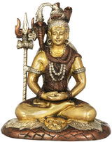 Mahayogi Shiva brass idol, seated with trident, gold face and tiger-skin base