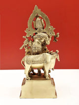 Natural brass Venugopala sculpture on horse/cow with flared halo back, ornate details