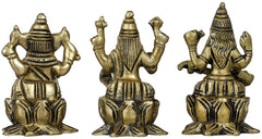 Brass Lakshmi, Ganesha, Saraswati small idols, side view of seated figures, 2 in