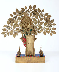 Brass Krishna flute statue with tree trunk, colorful clothing, 16-inch pedestal