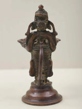 Brass Ganesha twin lamp figurine from behind, draped torso with two dish lamps