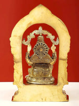 Brass Ganesha idol on pedestal with tall prabhavali backdrop, 9-inch