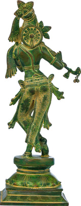 Back view green brass standing Krishna with flute, detailed crown and flowing ornaments