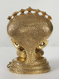 Brass Sheshnag base and back of seated Ganesha statue with textured scales