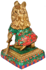Brass Laddoo Gopala idol side view, ornate green and red patterned base and robe