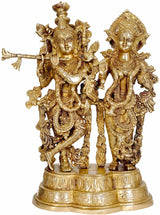 Brass statue of Radha and Krishna, ornate golden-detailed figures, 17 inches