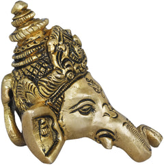 Brass Ganesha mask wall hanging, side view with ornate headdress and trunk, 2 in