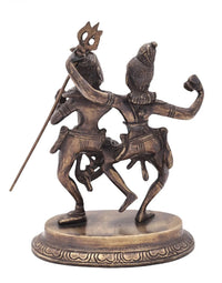 Antique brass Shiva-Parvati dancing pose statue with trident, round base