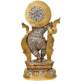 Back view brass Krishna figurine, circular halo, decorated jeweled outfit
