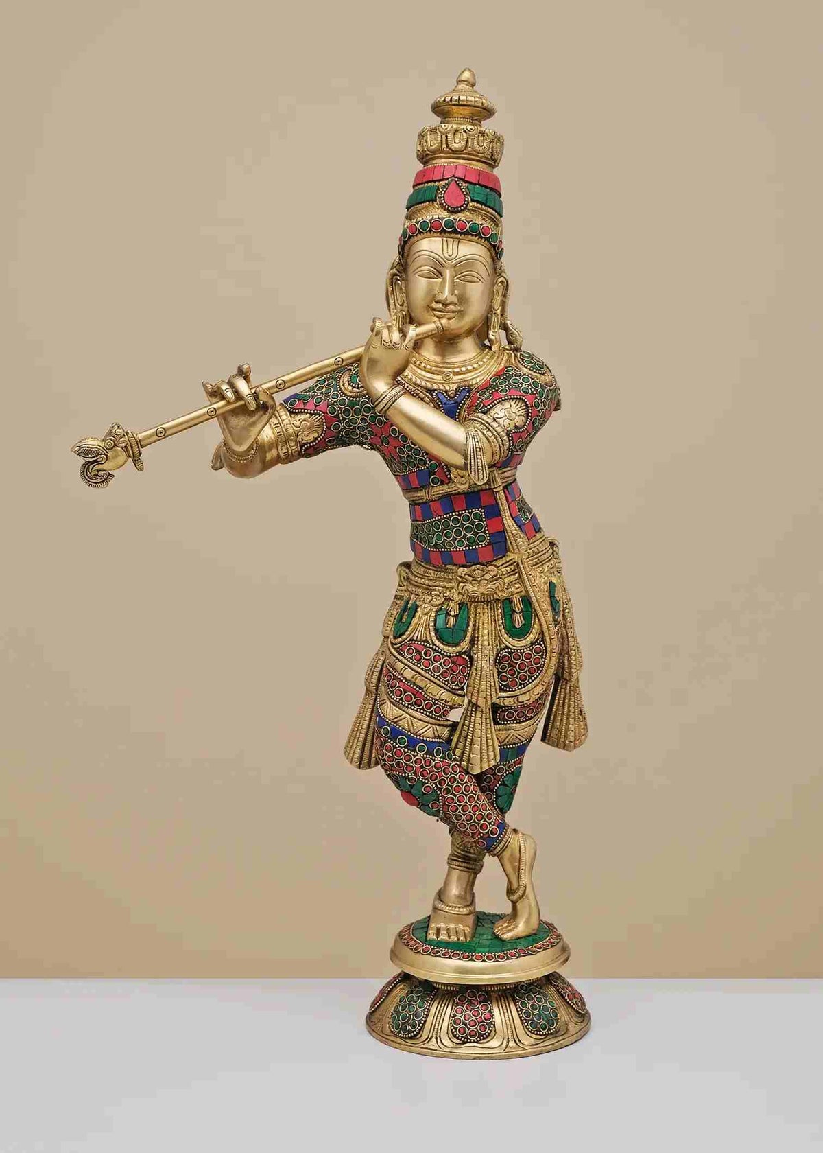 Brass Krishna fluting statue with colorful inlay, raised flute and detailed headgear