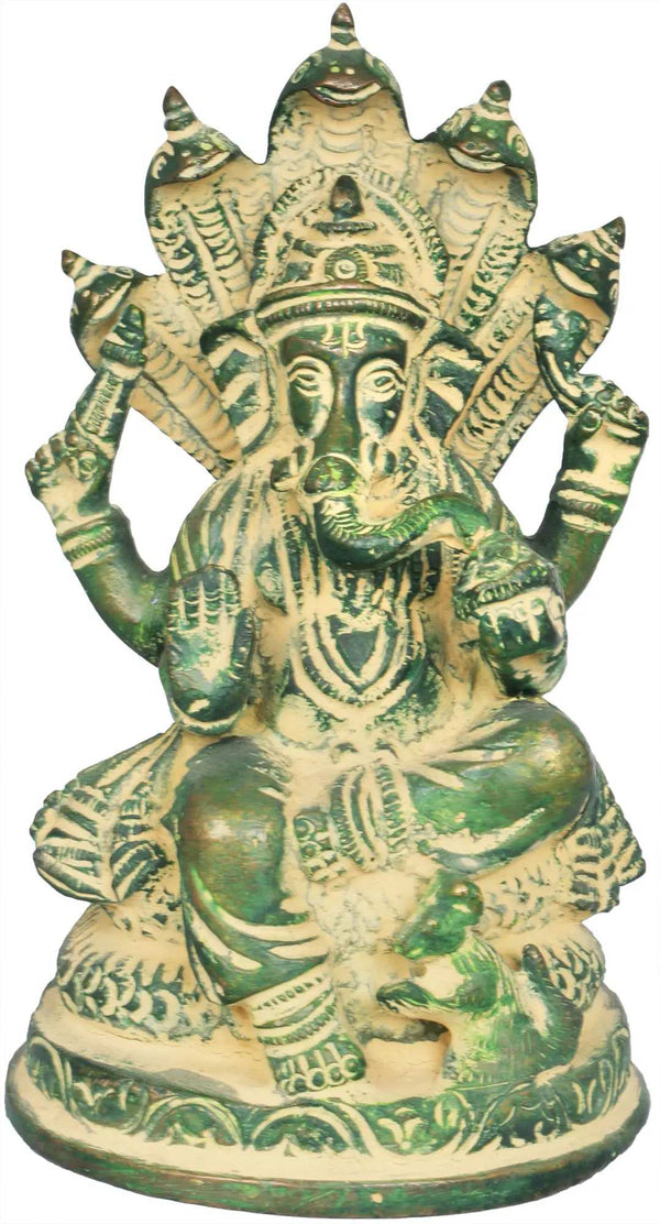 Small brass mudgreen sculpture of Ganesha seated on the Shesha Naga 5 inches