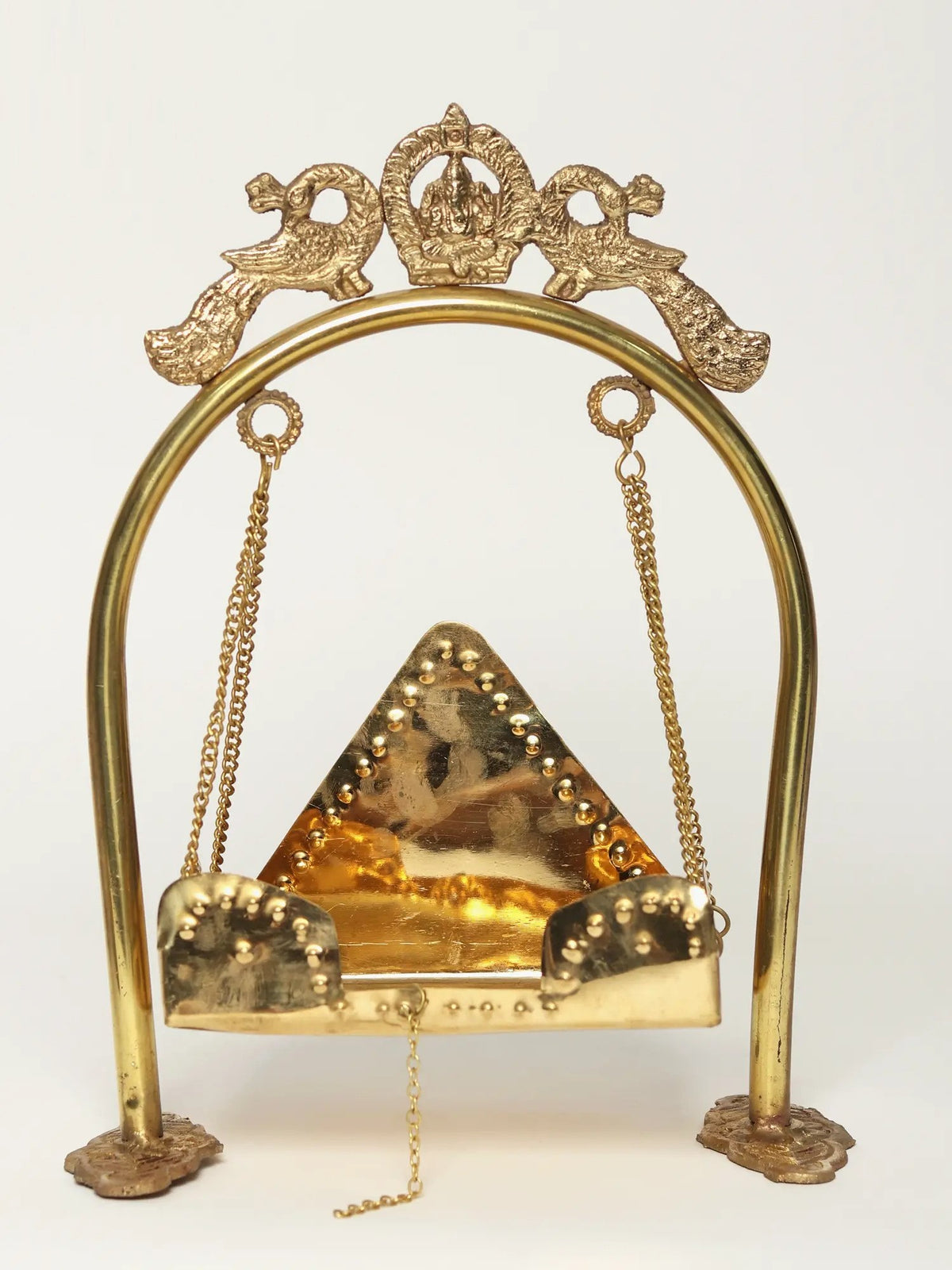 Brass peacock swing with chains and arched base, 7 cm height