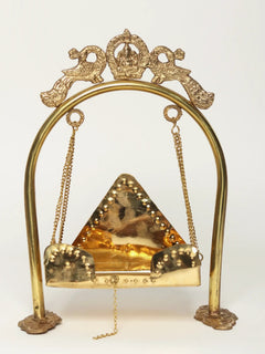 Brass peacock swing with chains and arched base, 7 cm height