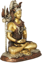 Seated Shiva brass statue with raised trident, gold face, beaded necklace