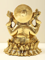 Brass Lord Ganesha back view, circular halo and textured lotus base detail