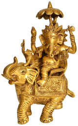 9-inch brass Ganesha idol seated on elephant, detailed crown and ornaments