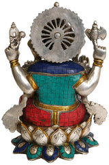 Brass Ganesha statue back view with large halo disc, teal and red tiled outfit